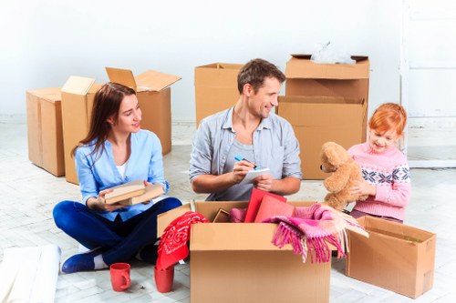 Local removals team preparing a move in Knightsbridge with careful handling of furniture
