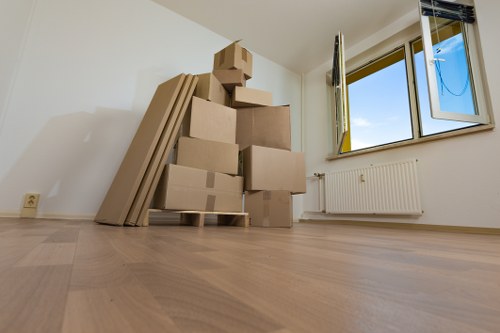 Moving team using protective equipment during a safe relocation in Knightsbridge