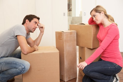 Professional movers handling furniture in Knightsbridge