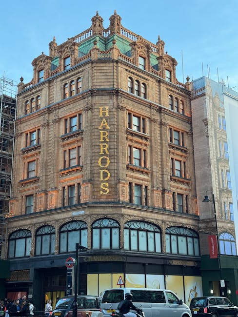 A rectangular white metal sign mounted on a brick wall, displaying the text 'WELCOME TO SOUTH KENSINGTON SW7' in black and red lettering. The sign is positioned outdoors, attached with visible screws at each corner, and is set against a background of reddish-brown bricks with a slightly textured surface. The image depicts a typical street or building façade in the South Kensington area, relevant for house removals and relocation services offered by Movers Knightsbridge, illustrating the initial point of contact or entry in a home relocation process involving furniture transport and packing and moving activities.